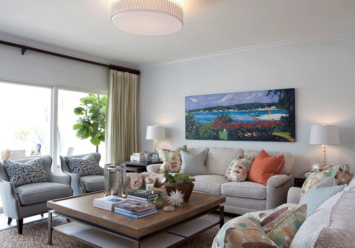 Living Room design by Lydia Uzzell Design and HÜIS Cayman